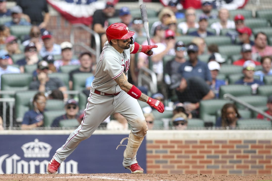 Oct 11, 2022; Atlanta, Georgia, USA; Philadelphia Phillies right fielder Nick Castellanos (8) hits a two-run single against the Atlanta Braves in the fourth inning during game one of the NLDS for the 2022 MLB Playoffs at Truist Park. Mandatory Credit: Brett Davis-USA TODAY Sports