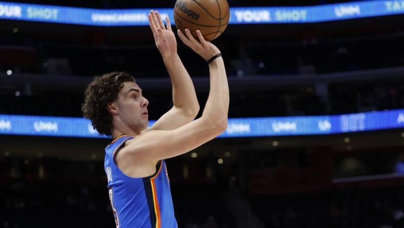 Oct 11, 2022; Detroit, Michigan, USA;  Oklahoma City Thunder guard Josh Giddey (3) shoots in the first half against the Detroit Pistons at Little Caesars Arena. Mandatory Credit: Rick Osentoski-USA TODAY Sports