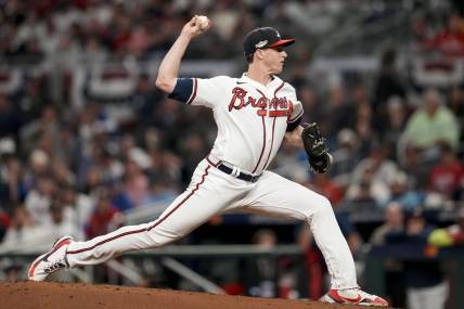 Oct 12, 2022; Atlanta, Georgia, USA; Atlanta Braves starting pitcher Kyle Wright (30) throws against the Philadelphia Phillies in the third inning during game two of the NLDS for the 2022 MLB Playoffs at Truist Park. Mandatory Credit: Dale Zanine-USA TODAY Sports