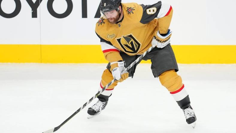 Oct 13, 2022; Las Vegas, Nevada, USA; Vegas Golden Knights center Phil Kessel (8) looks to shoot against the Chicago Blackhawks during the second period at T-Mobile Arena. Mandatory Credit: Stephen R. Sylvanie-USA TODAY Sports