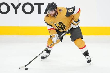 Oct 13, 2022; Las Vegas, Nevada, USA; Vegas Golden Knights center Phil Kessel (8) looks to shoot against the Chicago Blackhawks during the second period at T-Mobile Arena. Mandatory Credit: Stephen R. Sylvanie-USA TODAY Sports