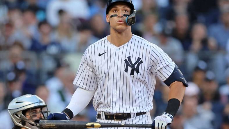 Oct 14, 2022; Bronx, New York, USA; New York Yankees right fielder Aaron Judge (99) reacts after striking out against the Cleveland Guardians during the seventh inning in game two of the ALDS for the 2022 MLB Playoffs at Yankee Stadium. Mandatory Credit: Brad Penner-USA TODAY Sports