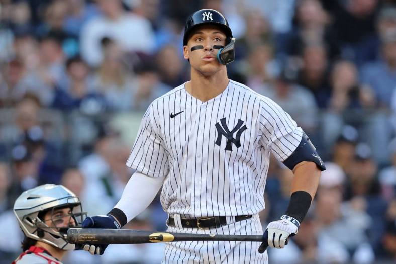 Oct 14, 2022; Bronx, New York, USA; New York Yankees right fielder Aaron Judge (99) reacts after striking out against the Cleveland Guardians during the seventh inning in game two of the ALDS for the 2022 MLB Playoffs at Yankee Stadium. Mandatory Credit: Brad Penner-USA TODAY Sports