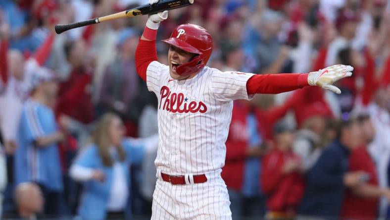 Oct 14, 2022; Philadelphia, Pennsylvania, USA; Philadelphia Phillies first baseman Rhys Hoskins celebrates after hitting a three-run home run against the Atlanta Braves during the 3rd inning in game three of the NLDS for the 2022 MLB Playoffs at Citizens Bank Park. Mandatory Credit: Bill Streicher-USA TODAY Sports