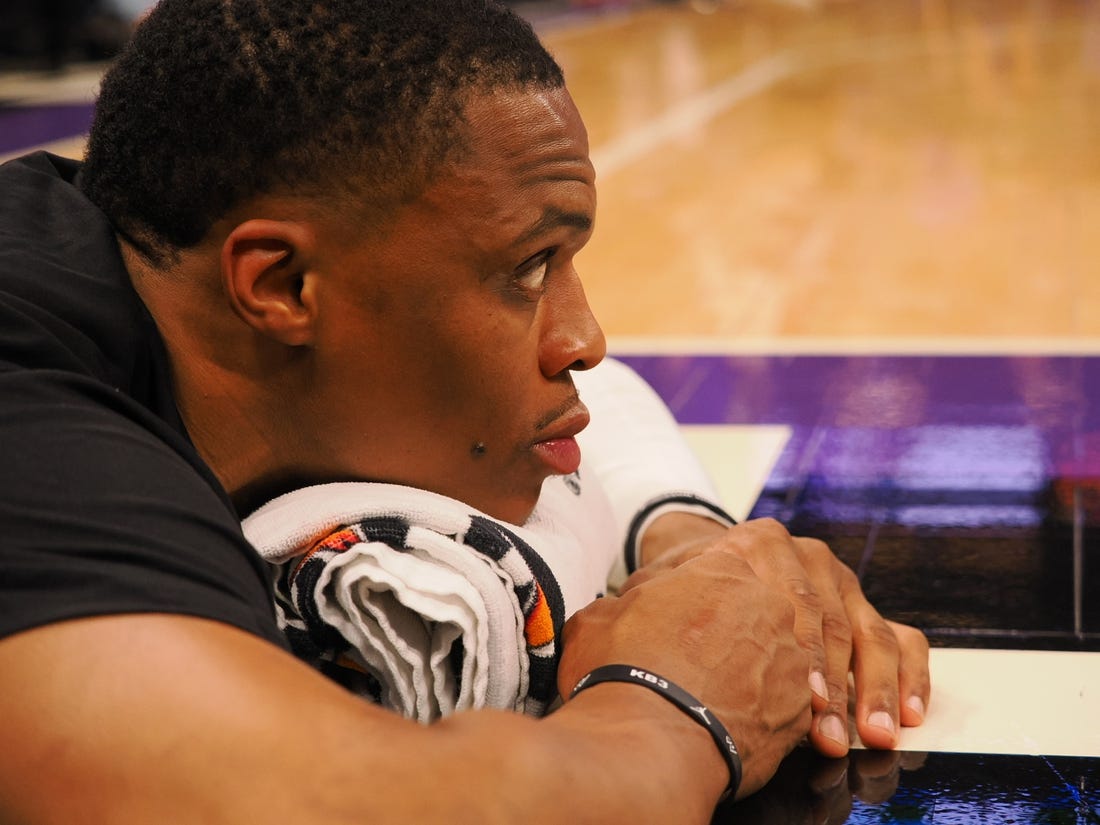 Oct 14, 2022; Sacramento, California, USA; Los Angeles Lakers point guard Russell Westbrook (0) stretches on the court before the game against the Sacramento Kings at Golden 1 Center. Mandatory Credit: Kelley L Cox-USA TODAY Sports