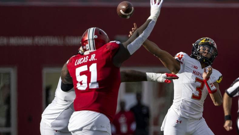 Oct 15, 2022; Bloomington, Indiana, USA; Maryland Terrapins quarterback Taulia Tagovailoa (3) throws the ball over Indiana Hoosiers defensive lineman Patrick Lucas Jr. (51) during the second quarter at Memorial Stadium. Mandatory Credit: Marc Lebryk-USA TODAY Sports