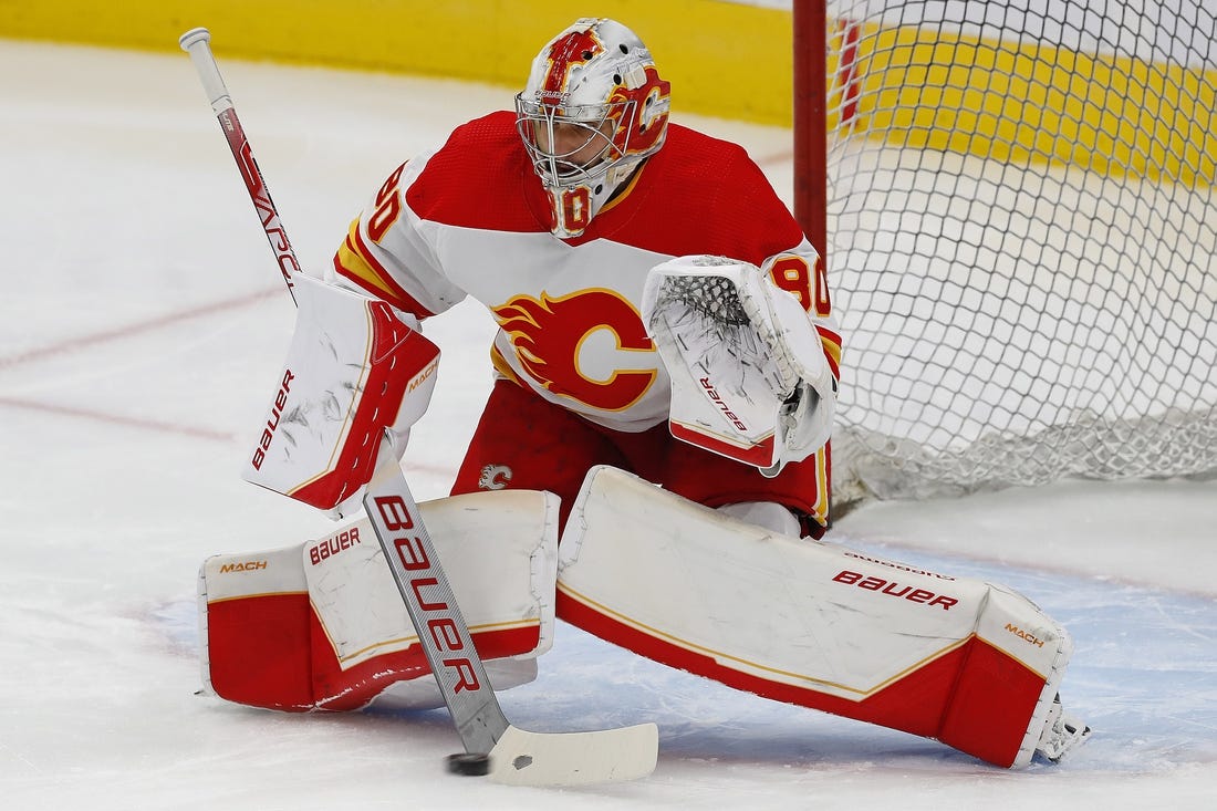 Oct 15, 2022; Edmonton, Alberta, CAN; Calgary Flames goaltender Dan Vladar (80) makes a save during warmup against the Edmonton Oilers at Rogers Place. Mandatory Credit: Perry Nelson-USA TODAY Sports