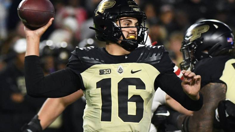 Oct 15, 2022; West Lafayette, Indiana, USA; Purdue Boilermakers quarterback Aidan O'Connell (16) throws a pass during the second half at Ross-Ade Stadium. Mandatory Credit: Robert Goddin-USA TODAY Sports