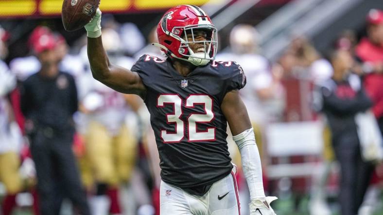 Oct 16, 2022; Atlanta, Georgia, USA; Atlanta Falcons safety Jaylinn Hawkins (32) reacts after an interception against the San Francisco 49ers at Mercedes-Benz Stadium. Mandatory Credit: Dale Zanine-USA TODAY Sports