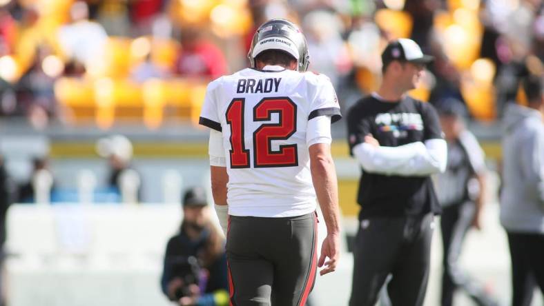 Tom Brady (12) of the Tampa Bay Buccaneers walks off the field during warmups at Acrisure Stadium in Pittsburgh, PA on October 16, 2022.

Pittsburgh Steelers Vs Tampa Bay Buccaneers Week 6