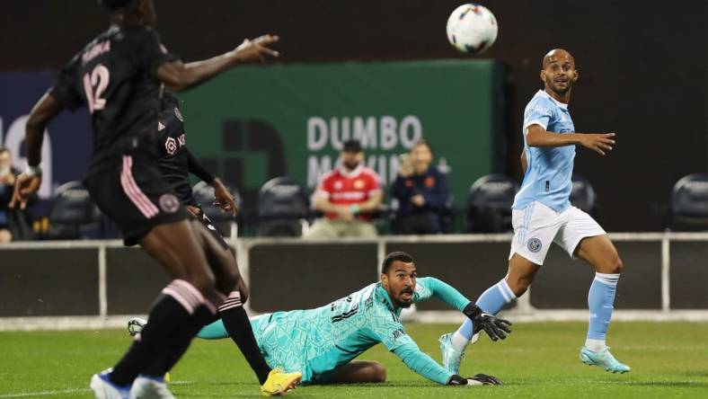 Oct 17, 2022; Queens, New York, USA; New York City FC forward Heber (9) moves to the ball as Inter Miami CF goalkeeper Drake Callender (27) moves to defend during the first half of a MLS Eastern Conference quarterfinal match at Citi Field. Mandatory Credit: Tom Horak-USA TODAY Sports