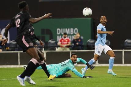Oct 17, 2022; Queens, New York, USA; New York City FC forward Heber (9) moves to the ball as Inter Miami CF goalkeeper Drake Callender (27) moves to defend during the first half of a MLS Eastern Conference quarterfinal match at Citi Field. Mandatory Credit: Tom Horak-USA TODAY Sports