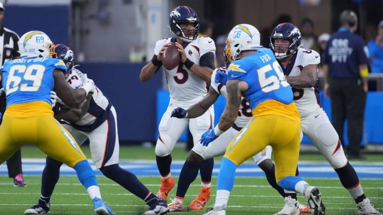 Oct 17, 2022; Inglewood, California, USA; Denver Broncos quarterback Russell Wilson (3) throws the ball in the first half against the Los Angeles Chargers at SoFi Stadium. Mandatory Credit: Kirby Lee-USA TODAY Sports