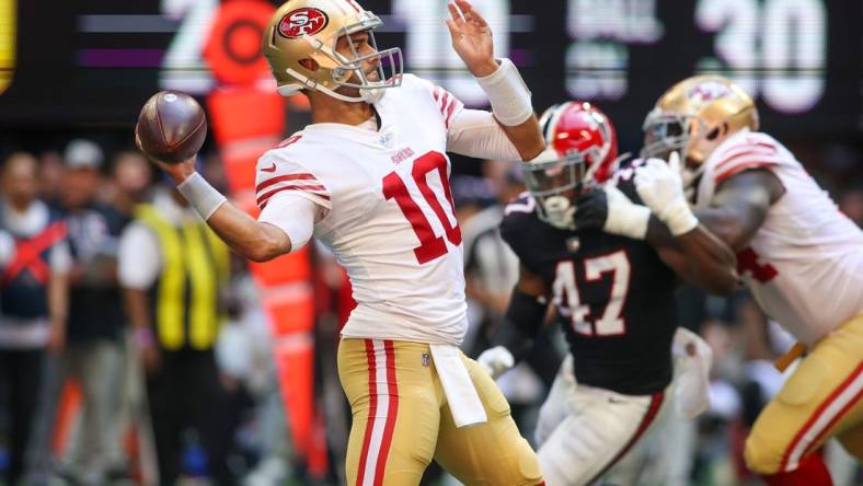 Oct 16, 2022; Atlanta, Georgia, USA; San Francisco 49ers quarterback Jimmy Garoppolo (10) throws a pass against the Atlanta Falcons in the second half at Mercedes-Benz Stadium. Mandatory Credit: Brett Davis-USA TODAY Sports