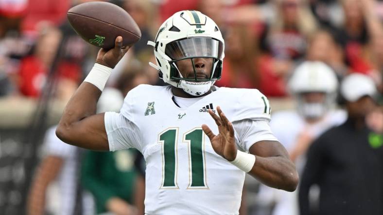 Sep 24, 2022; Louisville, Kentucky, USA;  South Florida Bulls quarterback Gerry Bohanon (11) looks to pass against the Louisville Cardinals during the second quarter at Cardinal Stadium. Louisville defeated South Florida 41-3. Mandatory Credit: Jamie Rhodes-USA TODAY Sports