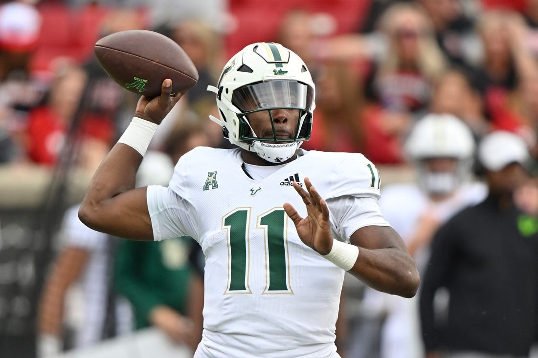 Sep 24, 2022; Louisville, Kentucky, USA;  South Florida Bulls quarterback Gerry Bohanon (11) looks to pass against the Louisville Cardinals during the second quarter at Cardinal Stadium. Louisville defeated South Florida 41-3. Mandatory Credit: Jamie Rhodes-USA TODAY Sports