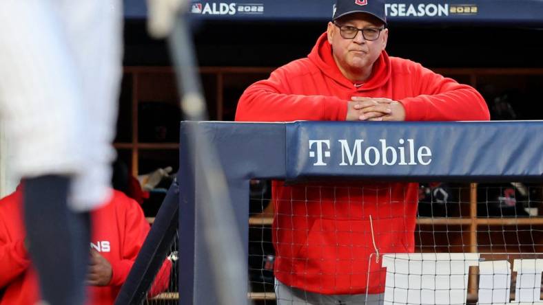 Oct 18, 2022; Bronx, New York, USA; Cleveland Guardians manager Terry Francona (77) watches New York Yankees right fielder Aaron Judge (99) at bat during the fifth inning in game five of the ALDS for the 2022 MLB Playoffs at Yankee Stadium. Mandatory Credit: Brad Penner-USA TODAY Sports