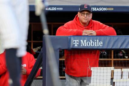 Oct 18, 2022; Bronx, New York, USA; Cleveland Guardians manager Terry Francona (77) watches New York Yankees right fielder Aaron Judge (99) at bat during the fifth inning in game five of the ALDS for the 2022 MLB Playoffs at Yankee Stadium. Mandatory Credit: Brad Penner-USA TODAY Sports