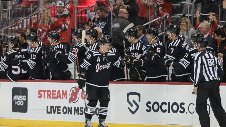 Oct 18, 2022; Newark, New Jersey, USA; New Jersey Devils left wing Ondrej Palat (18) celebrates his goal with teammates against the Anaheim Ducks during the second period at Prudential Center. Mandatory Credit: Vincent Carchietta-USA TODAY Sports