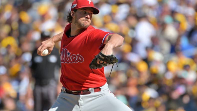 Oct 19, 2022; San Diego, California, USA; Philadelphia Phillies starting pitcher Aaron Nola (27) throws  pitch in the first inning against the San Diego Padres during game two of the NLCS for the 2022 MLB Playoffs at Petco Park. Mandatory Credit: Jayne Kamin-Oncea-USA TODAY Sports