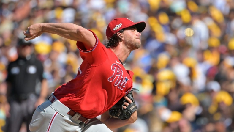 Oct 19, 2022; San Diego, California, USA; Philadelphia Phillies starting pitcher Aaron Nola (27) throws pitch in the first inning against the San Diego Padres during game two of the NLCS for the 2022 MLB Playoffs at Petco Park. Mandatory Credit: Jayne Kamin-Oncea-USA TODAY Sports