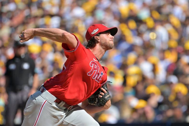 Oct 19, 2022; San Diego, California, USA; Philadelphia Phillies starting pitcher Aaron Nola (27) throws pitch in the first inning against the San Diego Padres during game two of the NLCS for the 2022 MLB Playoffs at Petco Park. Mandatory Credit: Jayne Kamin-Oncea-USA TODAY Sports