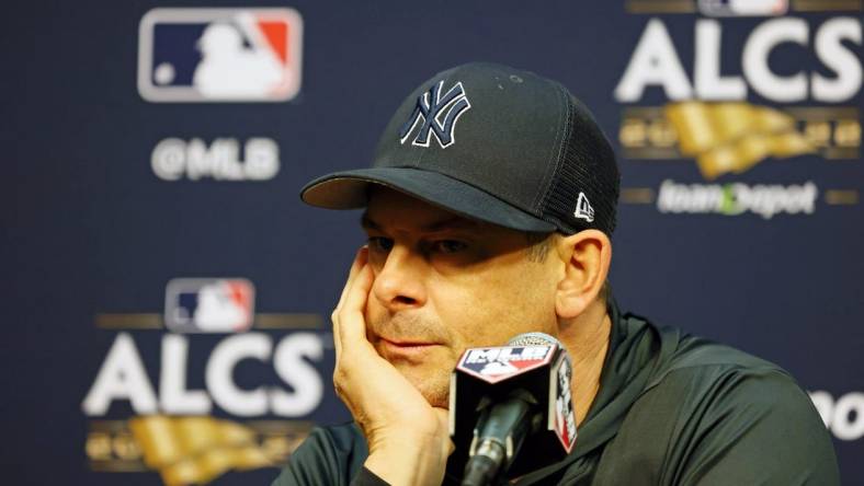 Oct 19, 2022; Houston, Texas, USA; New York Yankees manager Aaron Boone (17) talks to media during a press conference before game one of the ALCS for the 2022 MLB Playoffs against the Houston Astros at Minute Maid Park. Mandatory Credit: Thomas Shea-USA TODAY Sports