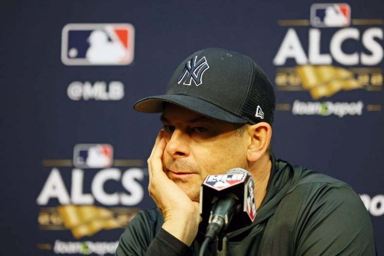 Oct 19, 2022; Houston, Texas, USA; New York Yankees manager Aaron Boone (17) talks to media during a press conference before game one of the ALCS for the 2022 MLB Playoffs against the Houston Astros at Minute Maid Park. Mandatory Credit: Thomas Shea-USA TODAY Sports