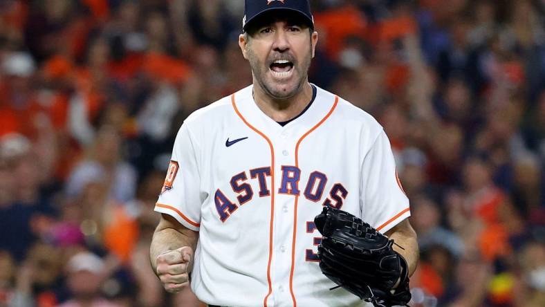 Oct 19, 2022; Houston, Texas, USA; Houston Astros starting pitcher Justin Verlander (35) reacts after striking out Houston Astros second baseman Jose Altuve (not pictured) to end the sixth inning in game one of the ALCS for the 2022 MLB Playoffs at Minute Maid Park. Mandatory Credit: Troy Taormina-USA TODAY Sports