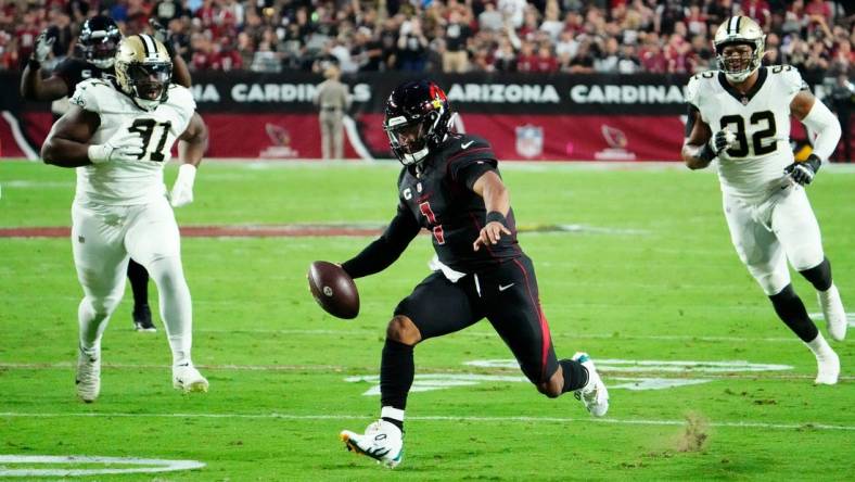 Oct 20, 2022; Glendale, Arizona, USA; Arizona Cardinals quarterback Kyler Murray (1) runs for a first down against the New Orleans Saints in the first half at State Farm Stadium. Mandatory Credit: Rob Schumacher-Arizona Republic

Nfl New Orleans Saints At Arizona Cardinals