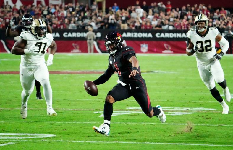 Oct 20, 2022; Glendale, Arizona, USA; Arizona Cardinals quarterback Kyler Murray (1) runs for a first down against the New Orleans Saints in the first half at State Farm Stadium. Mandatory Credit: Rob Schumacher-Arizona Republic

Nfl New Orleans Saints At Arizona Cardinals