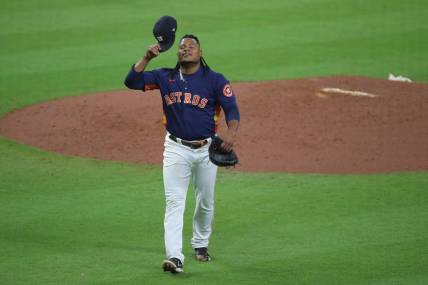 Oct 20, 2022; Houston, Texas, USA; Houston Astros starting pitcher Framber Valdez (59) reacts after completing the seventh inning against the New York Yankees during game two of the ALCS for the 2022 MLB Playoffs at Minute Maid Park. Mandatory Credit: Erik Williams-USA TODAY Sports