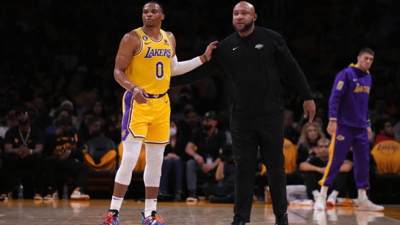 Oct 20, 2022; Los Angeles, California, USA; Los Angeles Lakers guard Russell Westbrook (0) and coach Darvin Ham react in the first half against the LA Clippers at Crypto.com Arena. Mandatory Credit: Kirby Lee-USA TODAY Sports