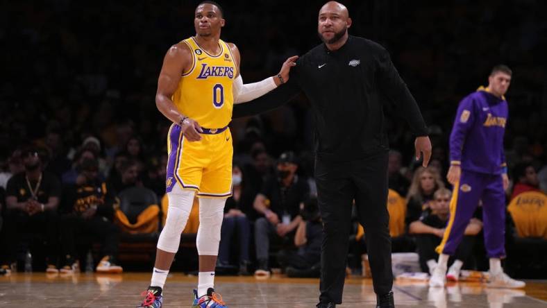 Oct 20, 2022; Los Angeles, California, USA; Los Angeles Lakers guard Russell Westbrook (0) and coach Darvin Ham react in the first half against the LA Clippers at Crypto.com Arena. Mandatory Credit: Kirby Lee-USA TODAY Sports