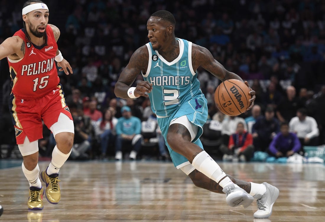 Oct 21, 2022; Charlotte, North Carolina, USA; Charlotte Hornets guard Terry Rozier (3) drives past New Orleans Pelicans guard Jose Alvarado (15) during the first half at the Spectrum Center. Mandatory Credit: Sam Sharpe-USA TODAY Sports