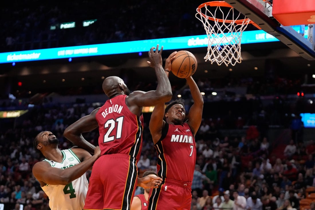 Oct 21, 2022; Miami, Florida, USA; Miami Heat guard Kyle Lowry (7) grabs a rebound against the Boston Celtics during the second quarter at FTX Arena. Mandatory Credit: Rich Storry-USA TODAY Sports