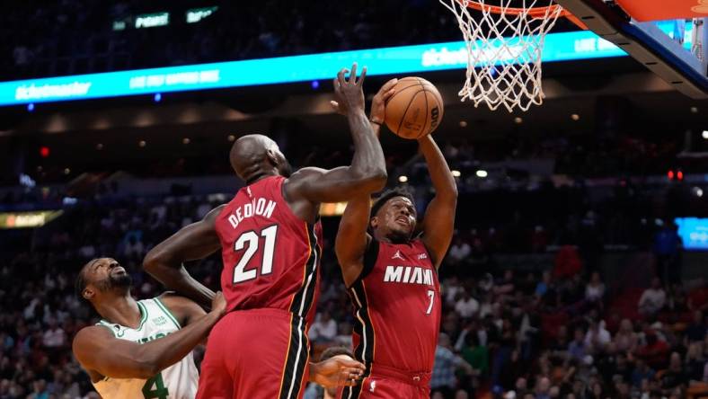 Oct 21, 2022; Miami, Florida, USA; Miami Heat guard Kyle Lowry (7) grabs a rebound against the Boston Celtics during the second quarter at FTX Arena. Mandatory Credit: Rich Storry-USA TODAY Sports