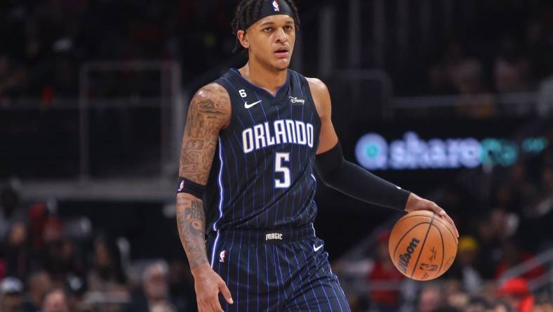 Oct 21, 2022; Atlanta, Georgia, USA; Orlando Magic forward Paolo Banchero (5) dribbles against the Atlanta Hawks in the second quarter at State Farm Arena. Mandatory Credit: Brett Davis-USA TODAY Sports