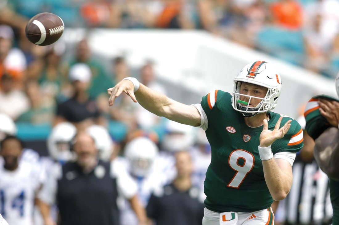 Oct 22, 2022; Miami Gardens, Florida, USA; Miami Hurricanes quarterback Tyler Van Dyke (9) throws the football during the first quarter against the Duke Blue Devils at Hard Rock Stadium. Mandatory Credit: Sam Navarro-USA TODAY Sports