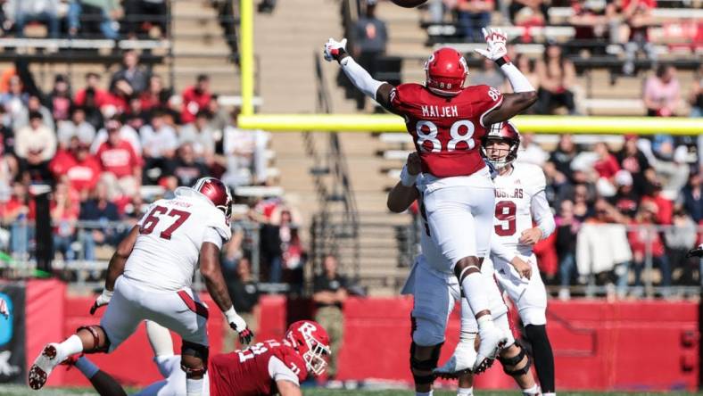 Oct 22, 2022; Piscataway, New Jersey, USA; Rutgers Scarlet Knights defensive lineman Ifeanyi Maijeh (88) blocks a pass thrown by Indiana Hoosiers quarterback Connor Bazelak (9) during the first half at SHI Stadium. Mandatory Credit: Vincent Carchietta-USA TODAY Sports