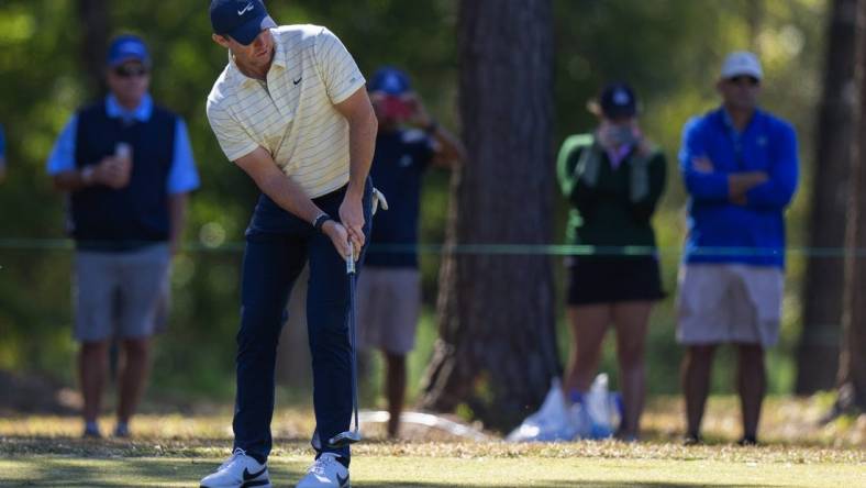 Oct 22, 2022; Ridgeland, South Carolina, USA; Rory McIlroy putts on the first green during the third round of THE CJ CUP in South Carolina golf tournament. Mandatory Credit: David Yeazell-USA TODAY Sports