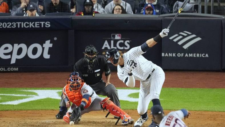 Oct 22, 2022; Bronx, New York, USA; New York Yankees right fielder Aaron Judge (99) strikes out in the sixth inning against the Houston Astros during game three of the ALCS for the 2022 MLB Playoffs at Yankee Stadium. Mandatory Credit: Robert Deutsch-USA TODAY Sports