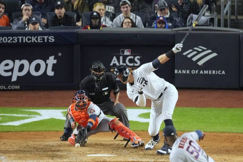 Oct 22, 2022; Bronx, New York, USA; New York Yankees right fielder Aaron Judge (99) strikes out in the sixth inning against the Houston Astros during game three of the ALCS for the 2022 MLB Playoffs at Yankee Stadium. Mandatory Credit: Robert Deutsch-USA TODAY Sports
