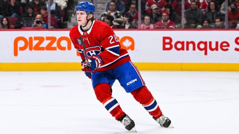 Oct 20, 2022; Montreal, Quebec, CAN; Montreal Canadiens center Christian Dvorak (28) against the Arizona Coyotes during the third period at Bell Centre. Mandatory Credit: David Kirouac-USA TODAY Sports