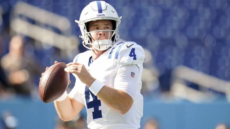 Oct 23, 2022; Nashville, Tennessee, USA; Indianapolis Colts quarterback Sam Ehlinger (4) warms up as the team gets ready to face the Tennessee Titans at Nissan Stadium Sunday, Oct. 23, 2022, in Nashville, Tenn.   Mandatory Credit: George Walker IV-USA TODAY Sports