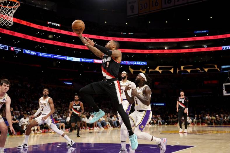 Oct 23, 2022; Los Angeles, California, USA;  Portland Trail Blazers guard Damian Lillard (0) goes to the basket during the second quarter against the Los Angeles Lakers at Crypto.com Arena. Mandatory Credit: Kiyoshi Mio-USA TODAY Sports