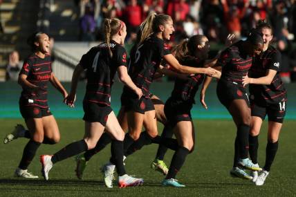 Oct 23, 2022; Portland, Oregon, USA; The Portland Thorns FC celebrate the win over San Diego Wave FC during the semifinals of the 2022 NWSL Playoffs at Providence Park. Mandatory Credit: Craig Mitchelldyer-USA TODAY Sports