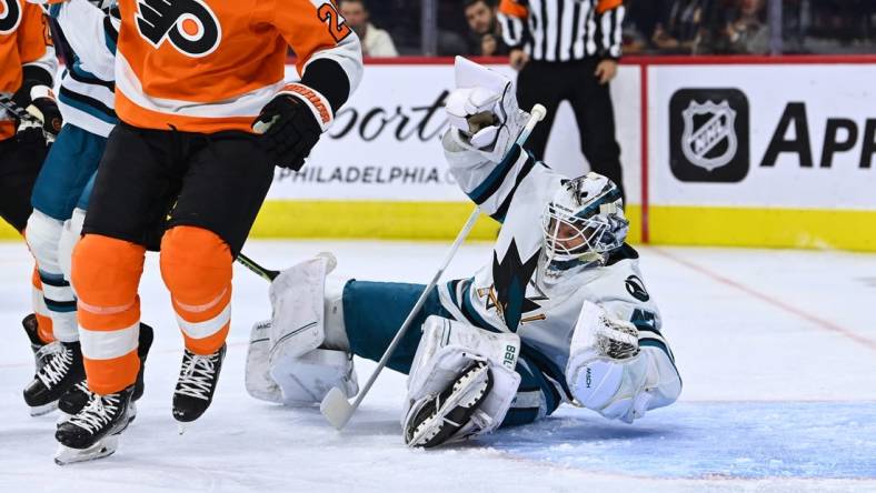 Oct 23, 2022; Philadelphia, Pennsylvania, USA; San Jose Sharks goalie James Reimer (47) dives against the Philadelphia Flyers in the first period at Wells Fargo Center. Mandatory Credit: Kyle Ross-USA TODAY Sports