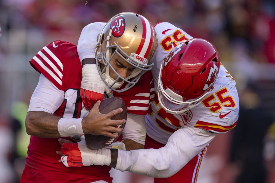 October 23, 2022; Santa Clara, California, USA; Kansas City Chiefs defensive end Frank Clark (55) tackles San Francisco 49ers quarterback Jimmy Garoppolo (10) for a safety during the fourth quarter at Levi's Stadium. Mandatory Credit: Kyle Terada-USA TODAY Sports