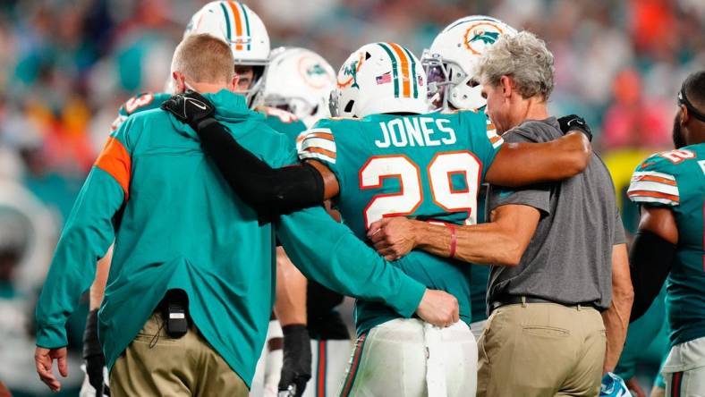 Oct 23, 2022; Miami Gardens, Florida, USA; Miami Dolphins safety Brandon Jones (29) leaves the field injured against the Pittsburgh Steelers during the second half at Hard Rock Stadium. Mandatory Credit: Rich Storry-USA TODAY Sports